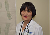 Doctor Cao teaching Anatomy at the East West College of Natural Medicine.