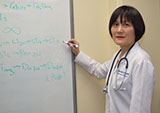 Doctor Cao teaching class at the East West College of Natural Medicine.